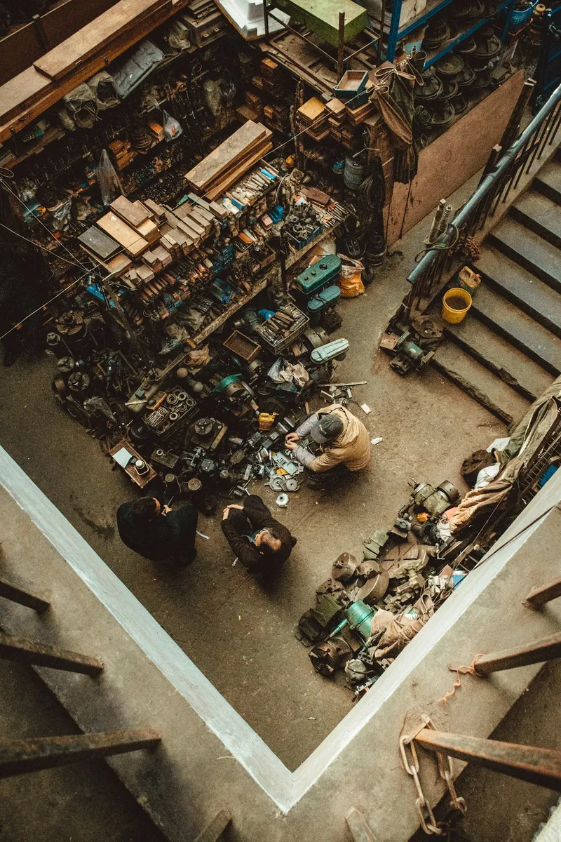 Mechanics working in an auto workshop
